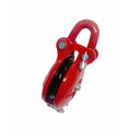 Industrial rigging block painted red with swivel eye and pulley