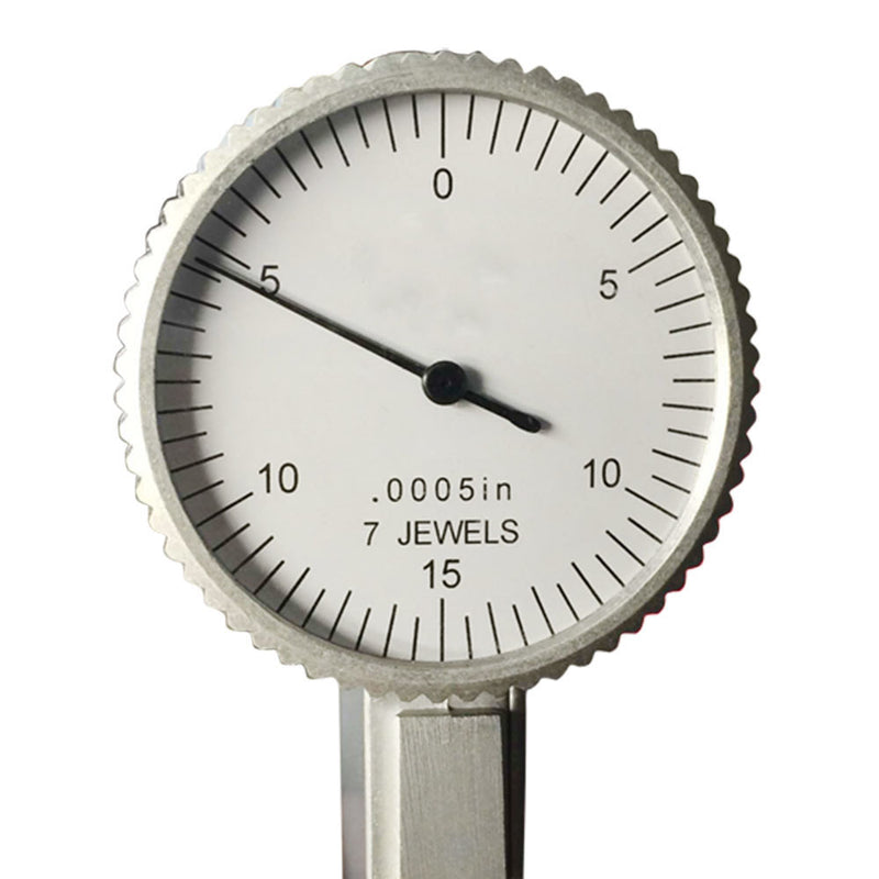 Compact arc welding machine in red with included welding tools and safety gear.