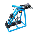 Heavy duty pipe bender with multi-die setup and reinforced triangular frame.