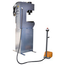 Close-up of hydraulic press with power control buttons and foot-operated pedal.