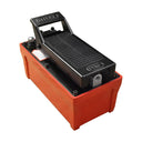 Red air hydraulic pump with black pedal, steel fittings, and reinforced pressure hose.