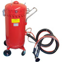 Red upright sandblasting machine with wheeled base and long black and orange vacuum hoses.
